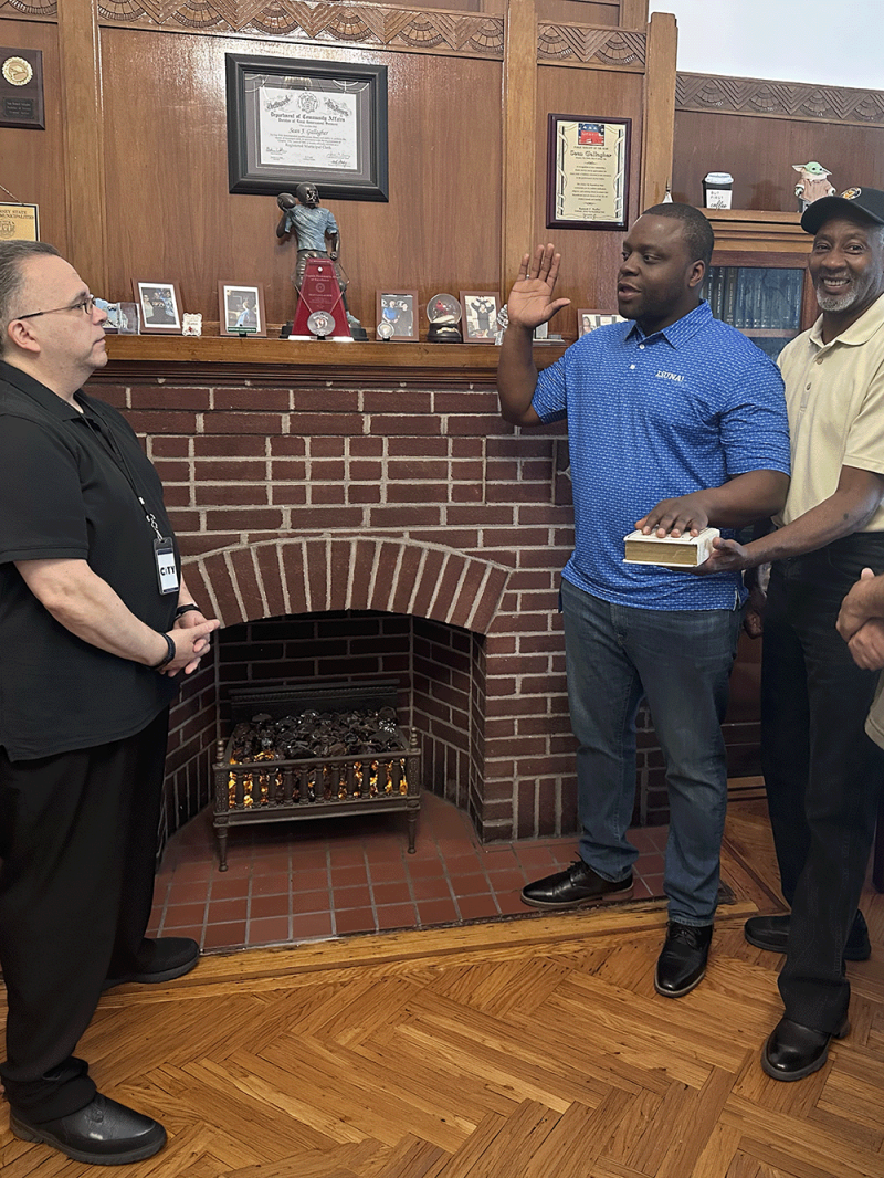 Chris Capers takes the oath of office to become a Jersey City Planning Board member