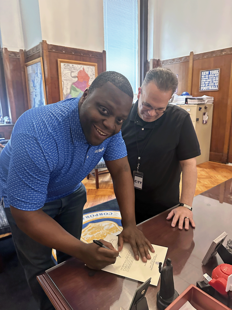 Signing the paperwork to officially become the newest Jersey City Planning Board member